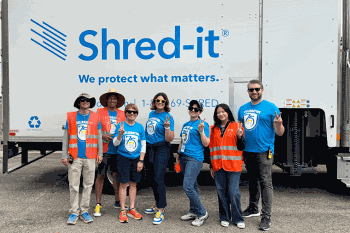 Staff with Shred-it truck